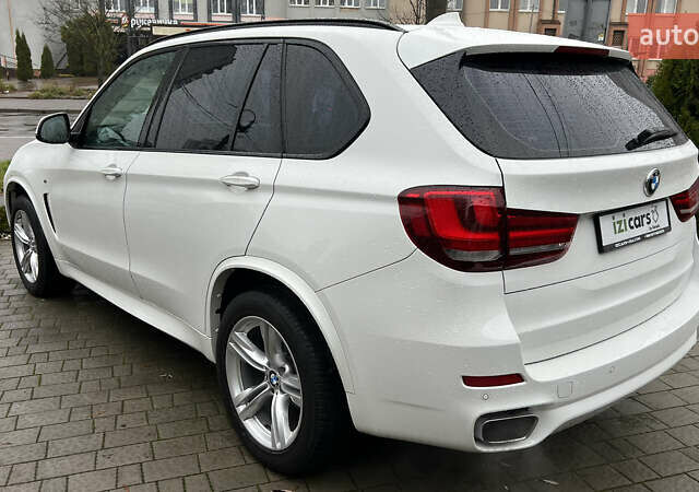 Білий БМВ Х5, об'ємом двигуна 2 л та пробігом 166 тис. км за 28000 $, фото 4 на Automoto.ua