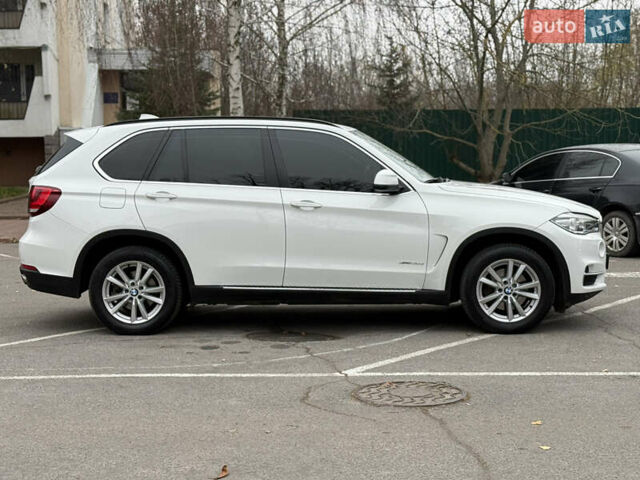 Білий БМВ Х5, об'ємом двигуна 2 л та пробігом 130 тис. км за 29500 $, фото 10 на Automoto.ua