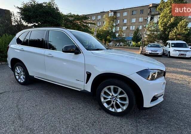 Белый БМВ Х5, объемом двигателя 2 л и пробегом 206 тыс. км за 26999 $, фото 2 на Automoto.ua