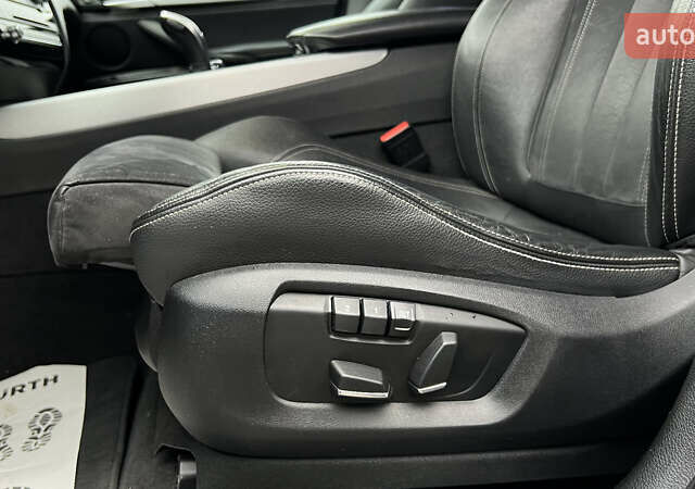 Білий БМВ Х5, об'ємом двигуна 2 л та пробігом 166 тис. км за 28000 $, фото 25 на Automoto.ua