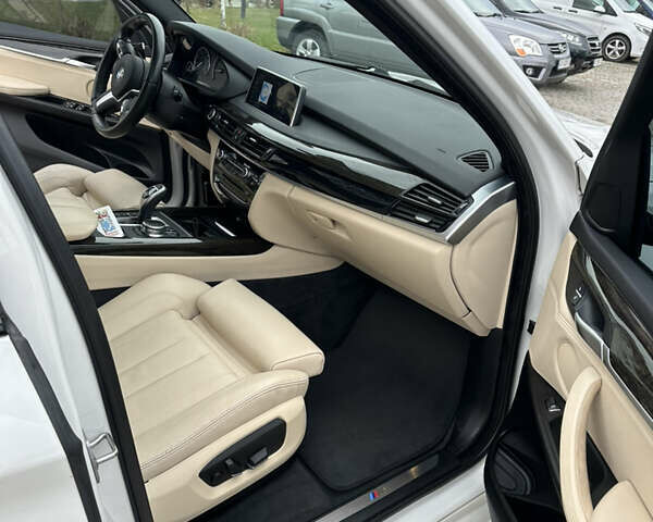 Білий БМВ Х5, об'ємом двигуна 2.98 л та пробігом 148 тис. км за 26000 $, фото 10 на Automoto.ua