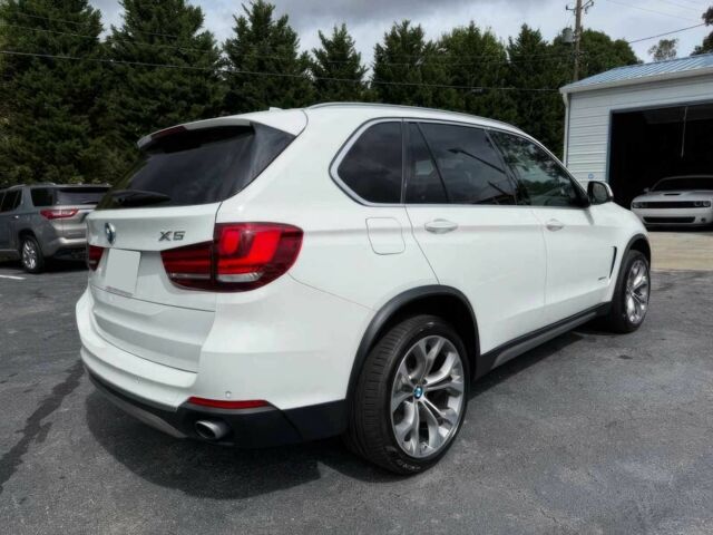 Белый БМВ Х5, объемом двигателя 3 л и пробегом 69 тыс. км за 15900 $, фото 7 на Automoto.ua