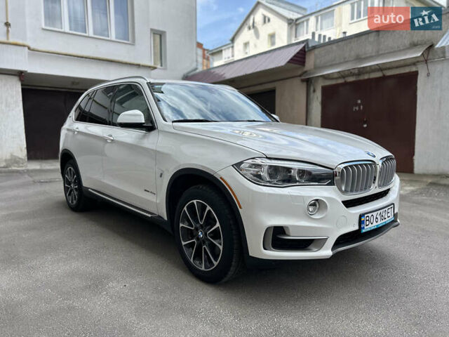 Белый БМВ Х5, объемом двигателя 2 л и пробегом 82 тыс. км за 33900 $, фото 1 на Automoto.ua