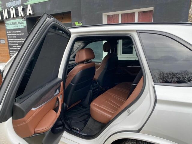 Белый БМВ Х5, объемом двигателя 3 л и пробегом 249 тыс. км за 35000 $, фото 4 на Automoto.ua