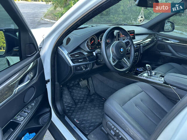 Белый БМВ Х5, объемом двигателя 2 л и пробегом 100 тыс. км за 32000 $, фото 5 на Automoto.ua