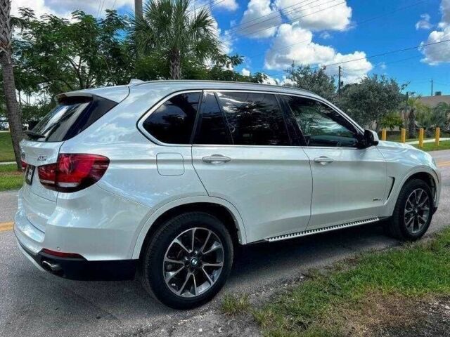 Белый БМВ Х5, объемом двигателя 3 л и пробегом 46 тыс. км за 9000 $, фото 4 на Automoto.ua