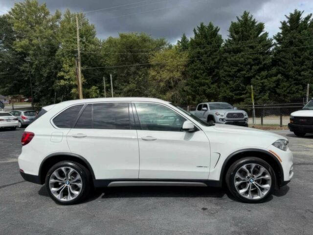 Белый БМВ Х5, объемом двигателя 3 л и пробегом 69 тыс. км за 15900 $, фото 3 на Automoto.ua