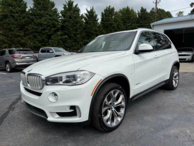 Белый БМВ Х5, объемом двигателя 3 л и пробегом 69 тыс. км за 15900 $, фото 2 на Automoto.ua