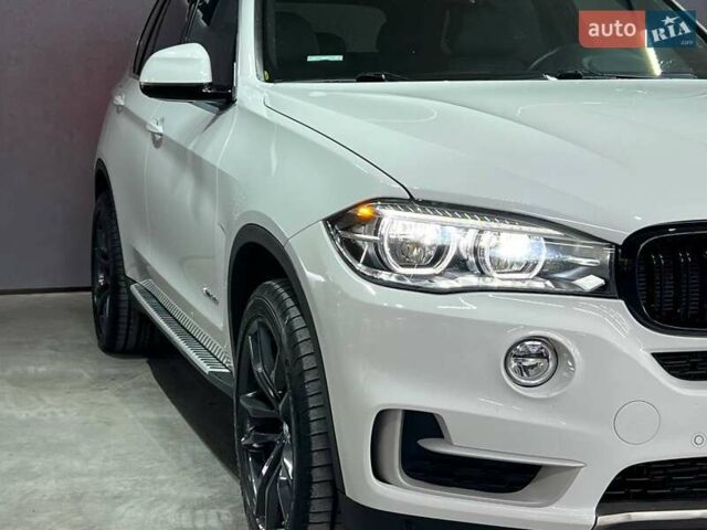 Белый БМВ Х5, объемом двигателя 2.98 л и пробегом 57 тыс. км за 34800 $, фото 1 на Automoto.ua