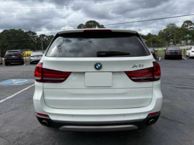 Белый БМВ Х5, объемом двигателя 3 л и пробегом 69 тыс. км за 15900 $, фото 6 на Automoto.ua