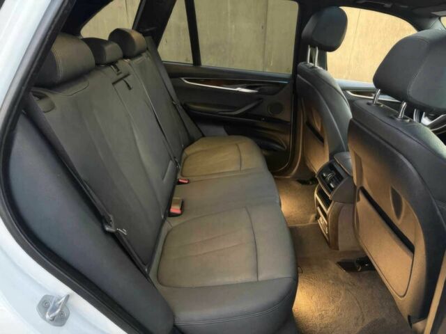 Белый БМВ Х5, объемом двигателя 3 л и пробегом 70 тыс. км за 15200 $, фото 9 на Automoto.ua