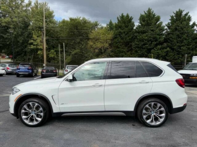 Белый БМВ Х5, объемом двигателя 3 л и пробегом 69 тыс. км за 15900 $, фото 4 на Automoto.ua