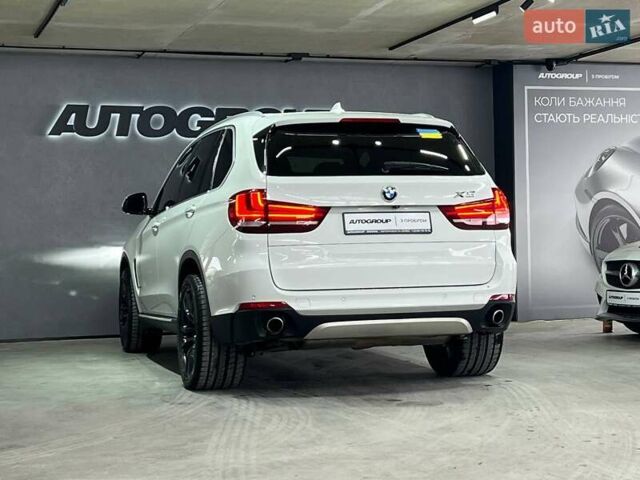 Белый БМВ Х5, объемом двигателя 2.98 л и пробегом 57 тыс. км за 34800 $, фото 4 на Automoto.ua