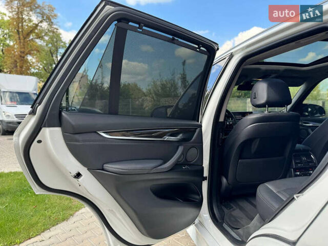 Белый БМВ Х5, объемом двигателя 2.98 л и пробегом 118 тыс. км за 33000 $, фото 29 на Automoto.ua