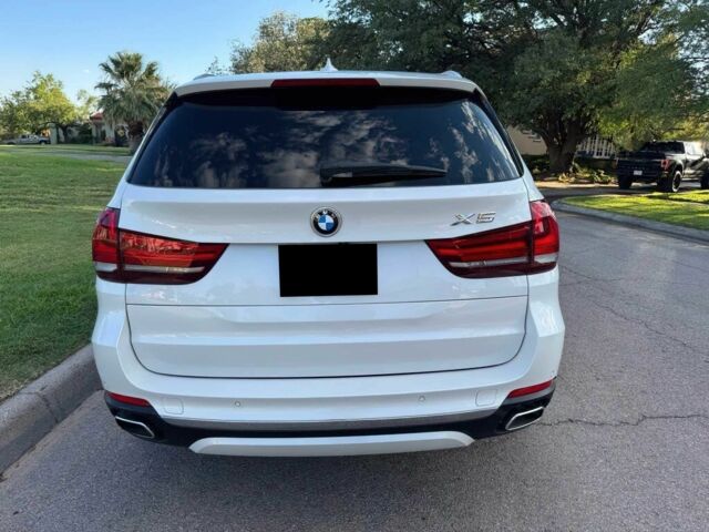 Белый БМВ Х5, объемом двигателя 3 л и пробегом 73 тыс. км за 19000 $, фото 5 на Automoto.ua