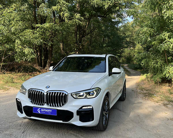 Белый БМВ Х5, объемом двигателя 3 л и пробегом 104 тыс. км за 53500 $, фото 2 на Automoto.ua