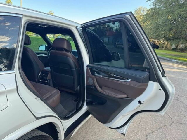 Белый БМВ Х5, объемом двигателя 3 л и пробегом 73 тыс. км за 19000 $, фото 13 на Automoto.ua