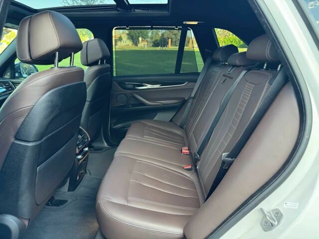 Белый БМВ Х5, объемом двигателя 3 л и пробегом 73 тыс. км за 19000 $, фото 11 на Automoto.ua