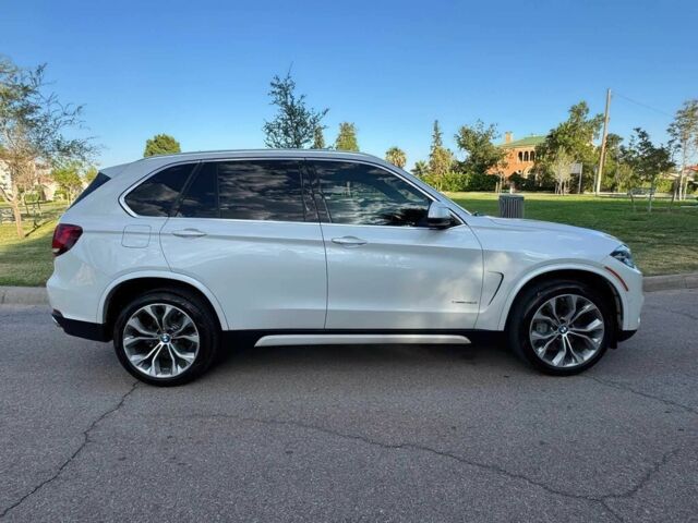 Белый БМВ Х5, объемом двигателя 3 л и пробегом 73 тыс. км за 19000 $, фото 3 на Automoto.ua