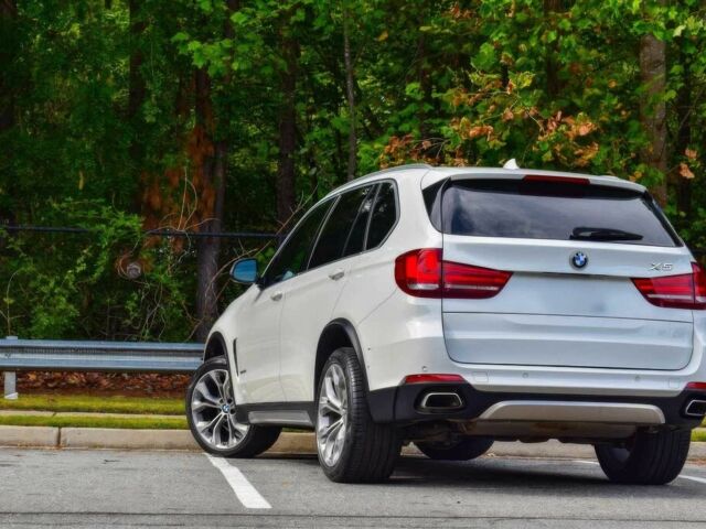 Білий БМВ Х5, об'ємом двигуна 3 л та пробігом 39 тис. км за 20000 $, фото 4 на Automoto.ua