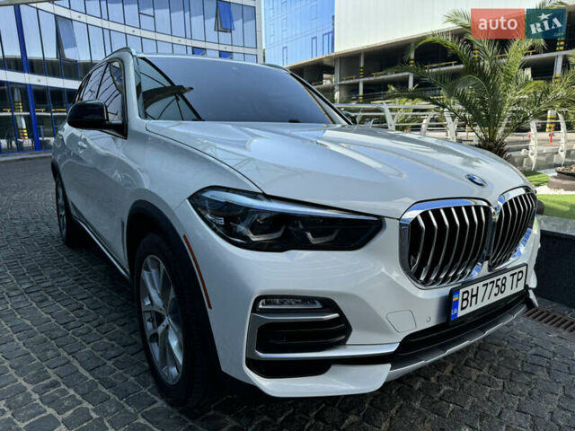 Белый БМВ Х5, объемом двигателя 3 л и пробегом 75 тыс. км за 57000 $, фото 1 на Automoto.ua