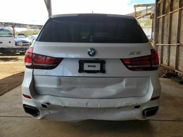 Белый БМВ Х5, объемом двигателя 2 л и пробегом 60 тыс. км за 10000 $, фото 5 на Automoto.ua