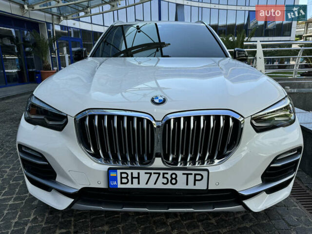 Белый БМВ Х5, объемом двигателя 3 л и пробегом 75 тыс. км за 57000 $, фото 5 на Automoto.ua