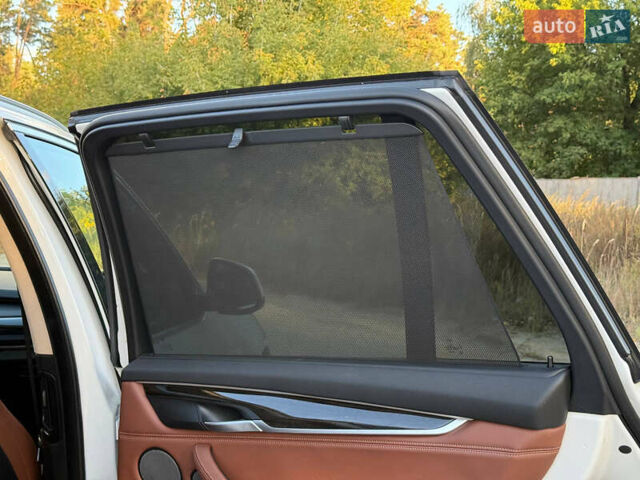 Белый БМВ Х5, объемом двигателя 3 л и пробегом 96 тыс. км за 41888 $, фото 28 на Automoto.ua