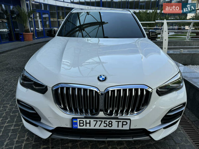 Белый БМВ Х5, объемом двигателя 3 л и пробегом 75 тыс. км за 57000 $, фото 4 на Automoto.ua