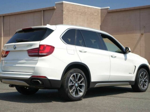 Белый БМВ Х5, объемом двигателя 4.4 л и пробегом 33 тыс. км за 10800 $, фото 5 на Automoto.ua