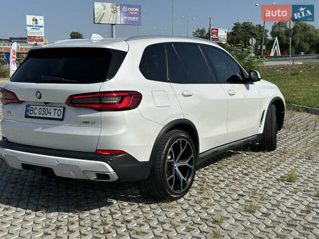 Белый БМВ Х5, объемом двигателя 3 л и пробегом 170 тыс. км за 48900 $, фото 4 на Automoto.ua