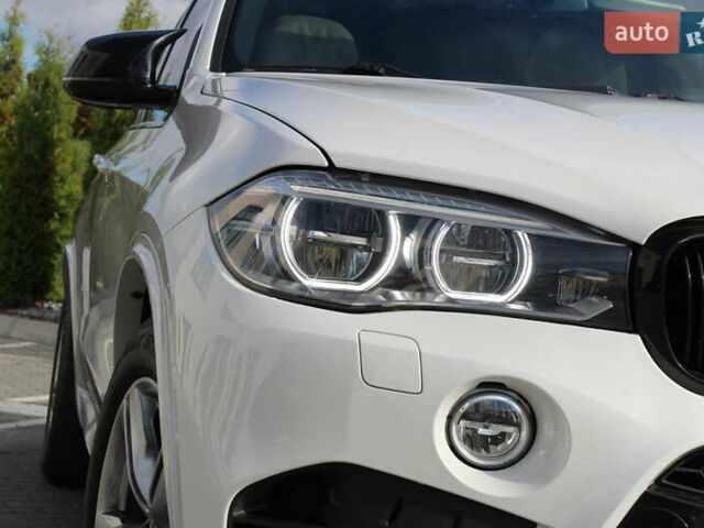 Белый БМВ Х5, объемом двигателя 3 л и пробегом 200 тыс. км за 36900 $, фото 7 на Automoto.ua