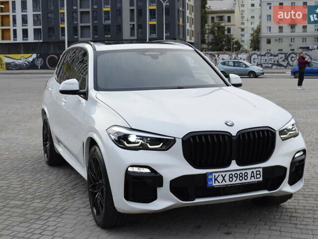 Белый БМВ Х5, объемом двигателя 3 л и пробегом 65 тыс. км за 56500 $, фото 1 на Automoto.ua