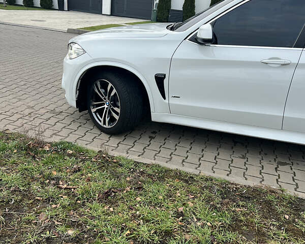 Белый БМВ Х5, объемом двигателя 2 л и пробегом 84 тыс. км за 41100 $, фото 2 на Automoto.ua