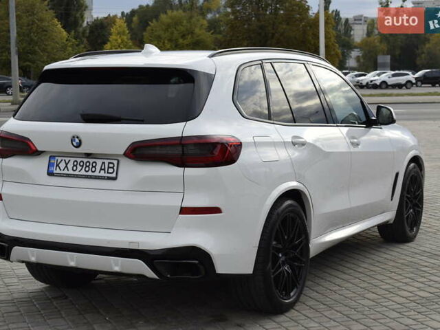 Белый БМВ Х5, объемом двигателя 3 л и пробегом 65 тыс. км за 56500 $, фото 4 на Automoto.ua