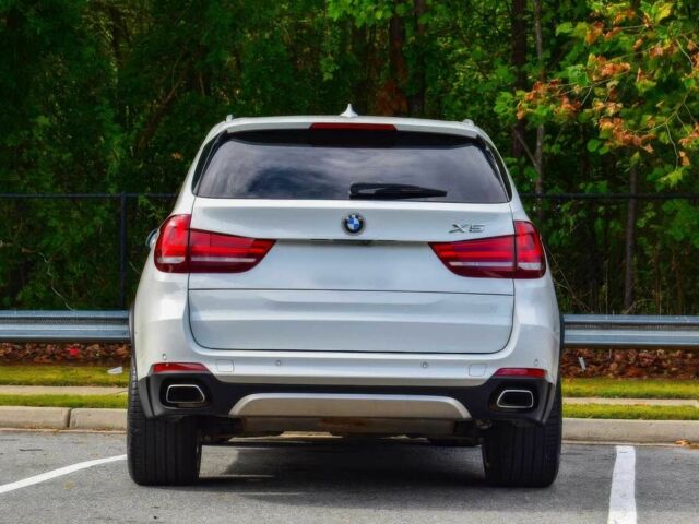 Білий БМВ Х5, об'ємом двигуна 3 л та пробігом 39 тис. км за 20000 $, фото 5 на Automoto.ua