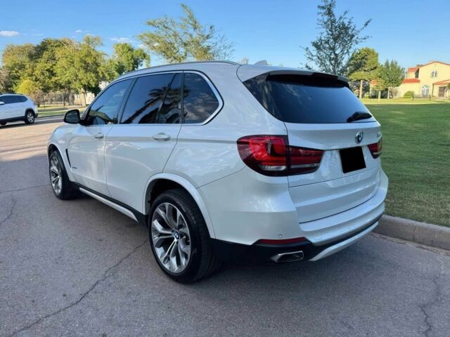 Белый БМВ Х5, объемом двигателя 3 л и пробегом 73 тыс. км за 19000 $, фото 4 на Automoto.ua