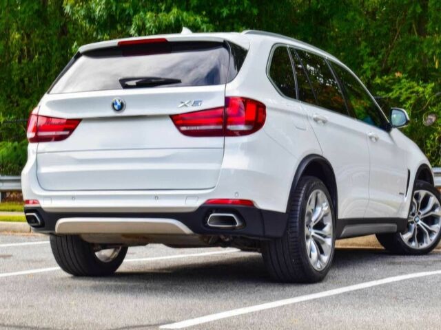 Білий БМВ Х5, об'ємом двигуна 3 л та пробігом 39 тис. км за 20000 $, фото 6 на Automoto.ua