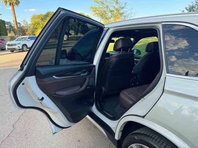 Белый БМВ Х5, объемом двигателя 3 л и пробегом 73 тыс. км за 19000 $, фото 9 на Automoto.ua