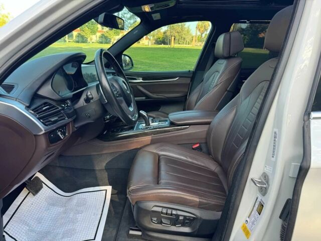 Белый БМВ Х5, объемом двигателя 3 л и пробегом 73 тыс. км за 19000 $, фото 7 на Automoto.ua