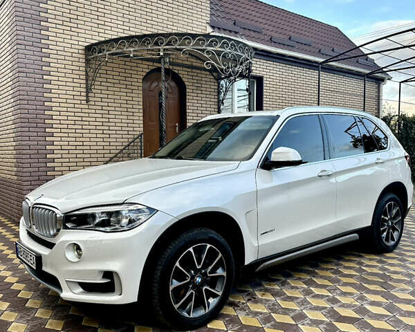 Белый БМВ Х5, объемом двигателя 2.98 л и пробегом 57 тыс. км за 28999 $, фото 4 на Automoto.ua