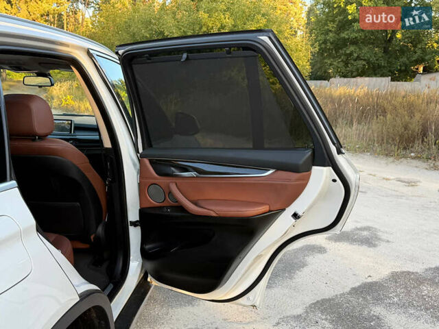 Белый БМВ Х5, объемом двигателя 3 л и пробегом 93 тыс. км за 41888 $, фото 30 на Automoto.ua