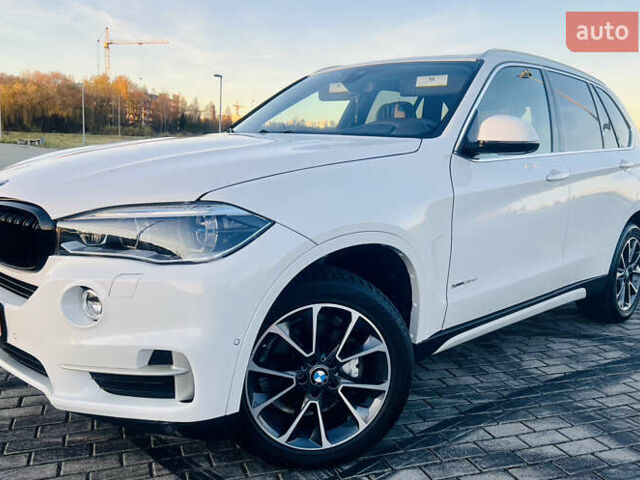 Белый БМВ Х5, объемом двигателя 3.01 л и пробегом 133 тыс. км за 35000 $, фото 2 на Automoto.ua