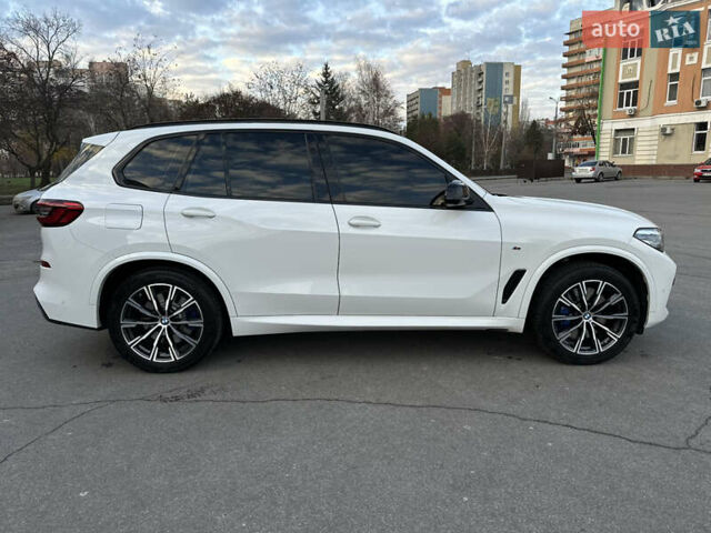 Белый БМВ Х5, объемом двигателя 3 л и пробегом 96 тыс. км за 64000 $, фото 4 на Automoto.ua