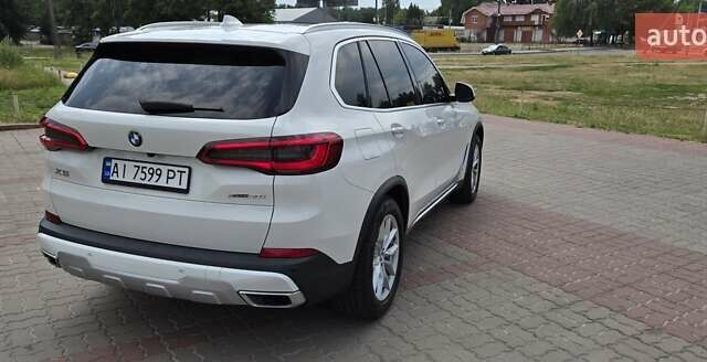 Белый БМВ Х5, объемом двигателя 3 л и пробегом 57 тыс. км за 50200 $, фото 4 на Automoto.ua