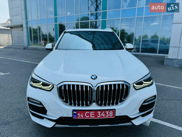 Белый БМВ Х5, объемом двигателя 3 л и пробегом 139 тыс. км за 45700 $, фото 1 на Automoto.ua