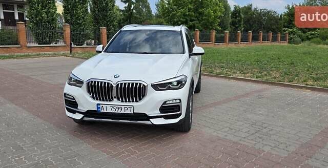 Белый БМВ Х5, объемом двигателя 3 л и пробегом 57 тыс. км за 50200 $, фото 7 на Automoto.ua