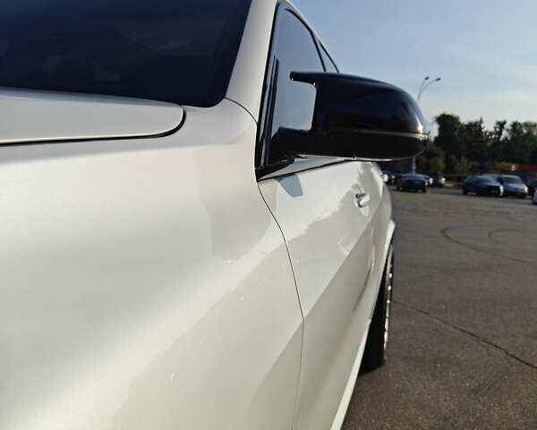 Белый БМВ Х5, объемом двигателя 3 л и пробегом 102 тыс. км за 53000 $, фото 1 на Automoto.ua