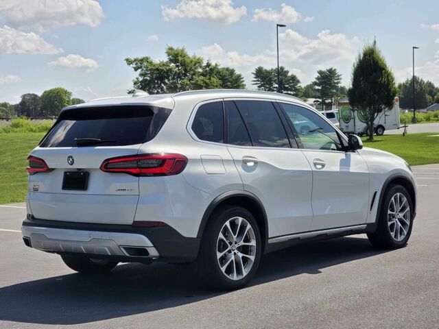 Білий БМВ Х5, об'ємом двигуна 3 л та пробігом 60 тис. км за 27000 $, фото 4 на Automoto.ua