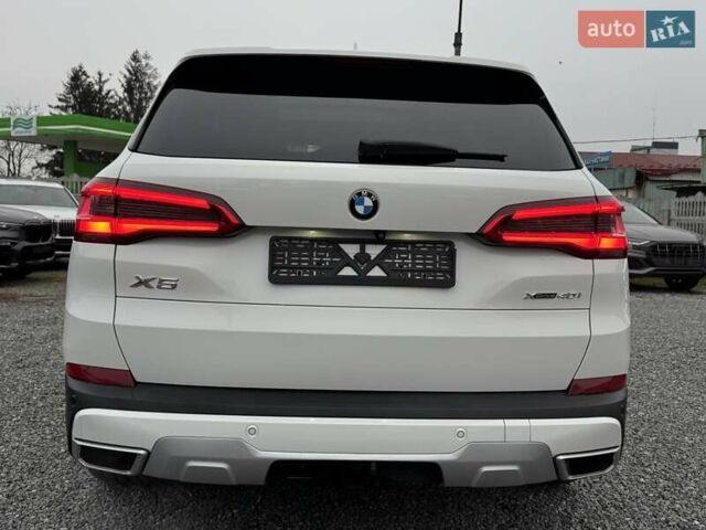 Белый БМВ Х5, объемом двигателя 3 л и пробегом 62 тыс. км за 50900 $, фото 28 на Automoto.ua